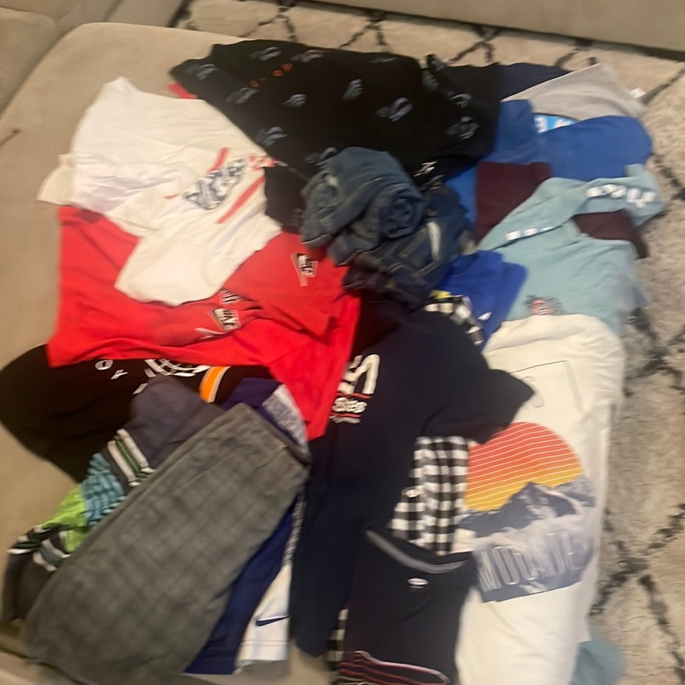 Large lot of boys clothing size large 16 shirts, two jeans, three shorts.